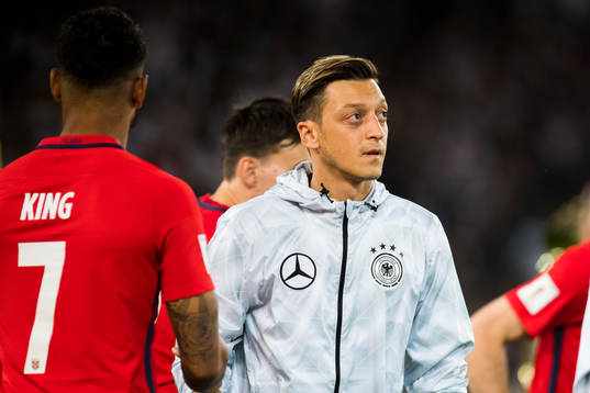 Mesut Özil of Germany and Joshua King of Norway