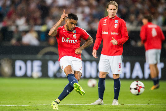 Joshua King and Stefan Johansen of Norway is warming up
