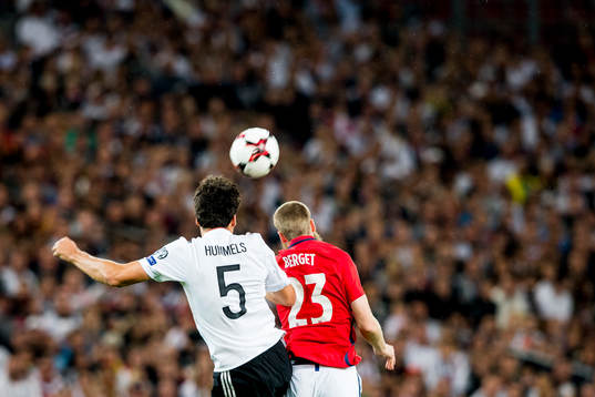 Mats Hummels of Germany and Jo Inge Berget of Norway