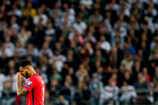 Joshua King of Norway looks dejected