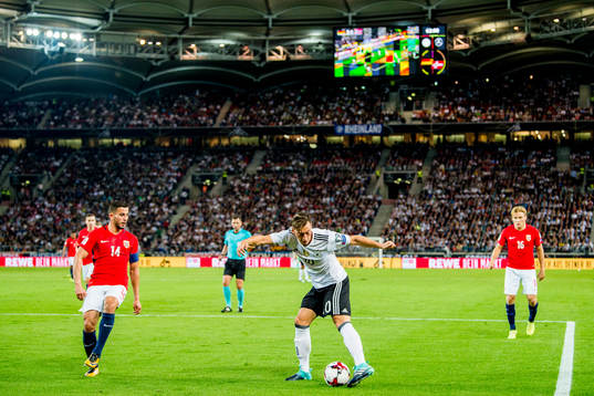 Omar Elabdellaoui of Norway and Mesut Özil of Germany