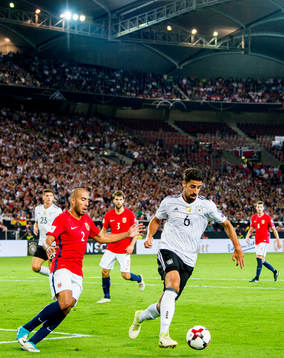 Haitam Aleesami of Norway and Sami Khedira of Germany