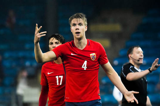 Rafik Zekhnini and Kristoffer Ajer of Norway  looks dejected