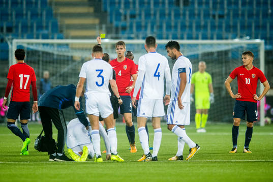 Kristoffer Ajer of Norway is shown a yellow card by referee