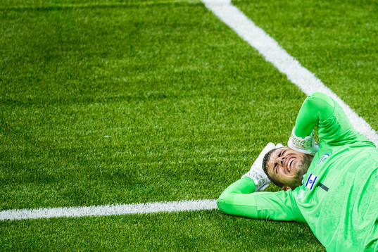 Goalkeeper Sahar Hasson of Israel lies down