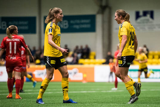 Marte Berget of LSK kvinner celebrates with his teammate