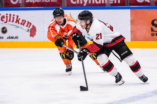 Malmö Redhawks Andy Miele och Karlskronas Marcus Paulsson