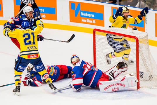 Robin Dahlstrøm of Storhamar celebrates with teammate