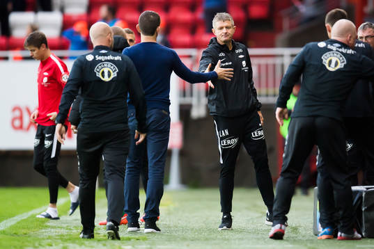 Eirik Bakke, head coach of Sogndal, shakes the hand of Lars