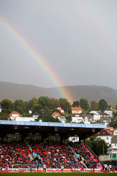A rainbow is seen over the arena