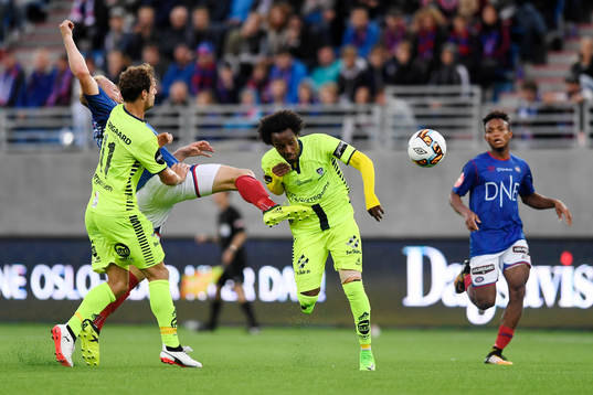 Joackim Jörgensen, of Sarpsborg competes for the ball with