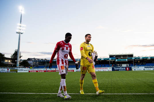 Goalkeeper Gudmund Taksdal Kongshavn of Tromsø (right)