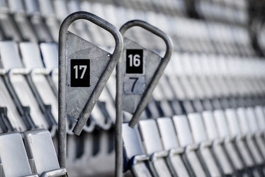 Sittplatser på Örjans Vall före fotbollsmatchen i