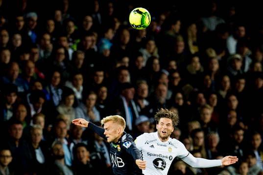 Eirik Ulland Andersen of Strømsgodset and Marius Lundemo