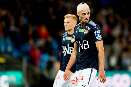 Bassel Jradi of Strømsgodset with a bandage around his head