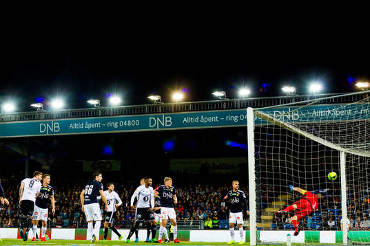 Nicklas Bendtner of Rosenborg scores 0-1 behind goalkeeper