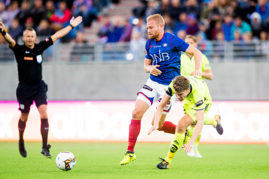 Henrik Kjelsrud Johansen of Vålerenga and Sigurd Rosted of