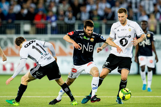 Mounir Hamoud of Strømsgodset in action against Yann-Erik