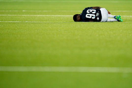 Tokmac Nguen of Strømsgodset lies down