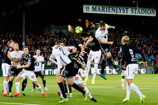Lars Vilsvik of Strømsgodset and Nicklas Bendtner of