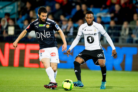 Mounir Hamoud of Strømsgodset and Samuel Adegbenro of