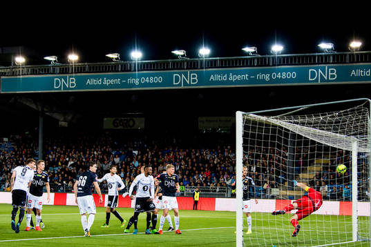 Nicklas Bendtner of Rosenborg scores 0-1 behind goalkeeper