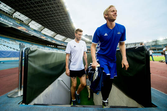 Nicklas Bendtner and goalkeeper Arild Østbø of Rosenborg
