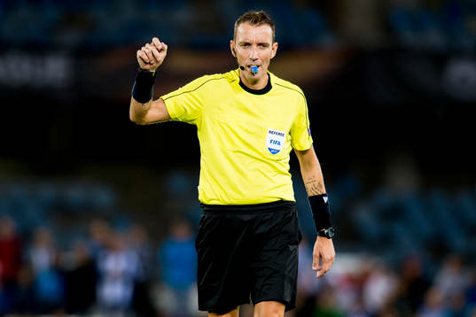 Referee Paolo Silvio Mazzoleni of Italy