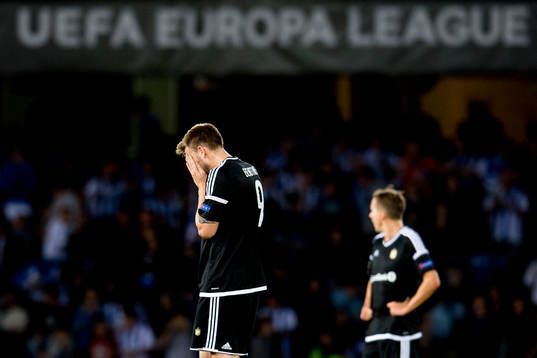Nicklas Bendtner of Rosenborg looks dejected