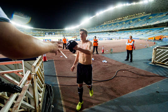 Pål André Helland of Rosenborg gives away his shirt