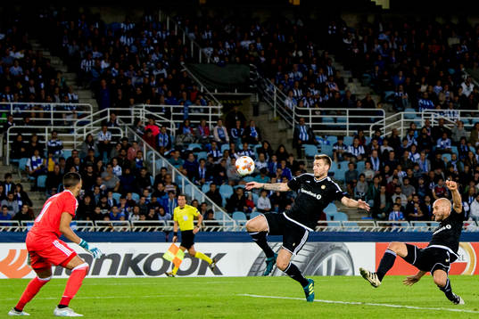 Nicklas Bendtner and Tore Reginiussen of Rosenborg miss a