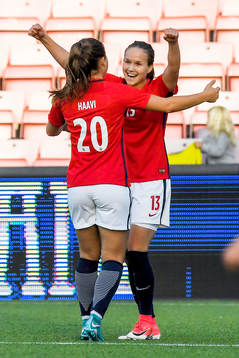 Guro Reiten of Norway celebrates with her teammate Emilie