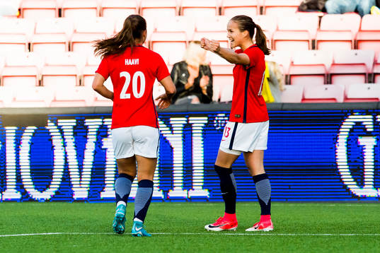Guro Reiten of Norway celebrates with her teammate Emilie