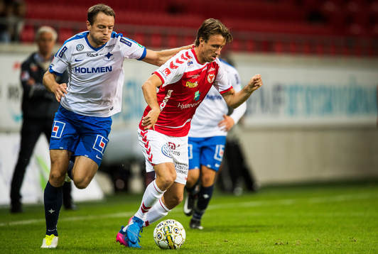 Kalmars Filip Hellquist och Norrköpings Jon Gudni Fjoluson