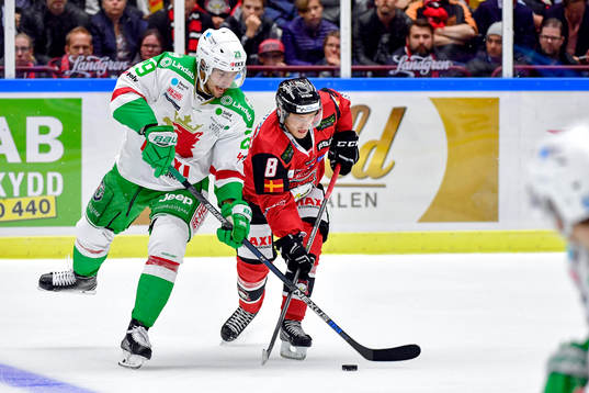 Rögles Ludvig Rensfeldt och Malmö Redhawks Johan Olofsson