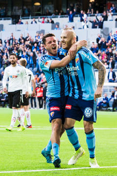 Djurgårdens Magnus Eriksson jublar med Kerim Mrabti