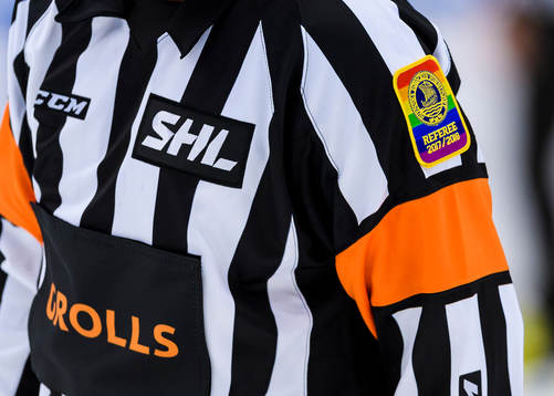 Generell bild på domarnas regnbågsfärgade märke