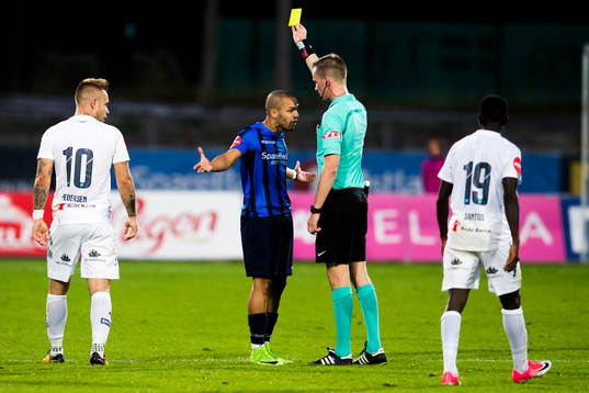 Ahmed el Amarani of Stabæk is shown a yellow card by the