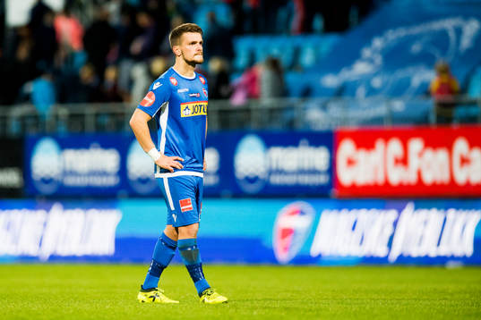 Flamur Kastrati of Sandefjord looks dejected