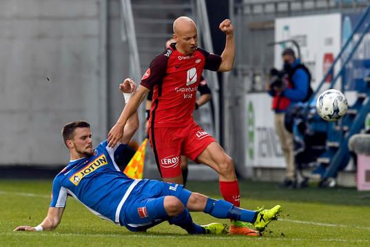 Ruben Kristiansen of Brann and Flamur Kastrati of Sandefjord