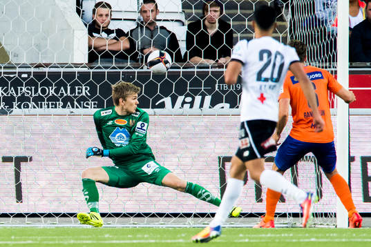 Goalkeeper Andreas Lie of Aalesund see the ball pass for 2-0