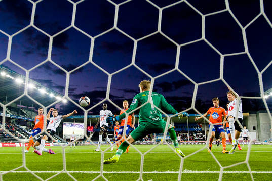 Elbasan Rashani of Odd scores 3-0 behind Goalkeeper Andreas