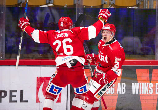 Timrås Johan Johnsson och Hampus Larsson jublar