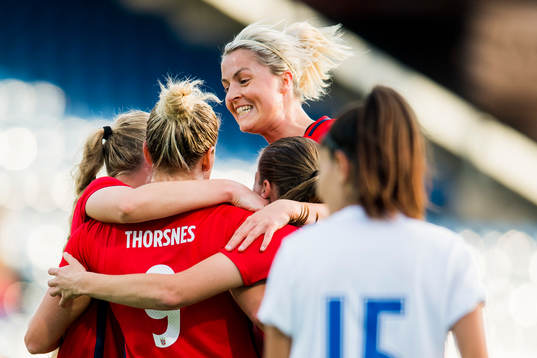 Elise Thorsnes of Norway celebrates with her teammates