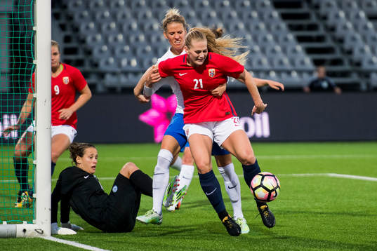 Goalkeeper Maria Korenciova, Jana Vojtekova of Slovakia and