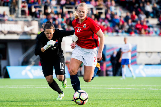 Goalkeeper Maria Korenciova of Slovakia and Lisa-Marie