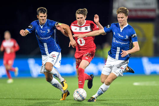 Joachim Thomassen of Sarpsborg and Riku Riski of Odd and