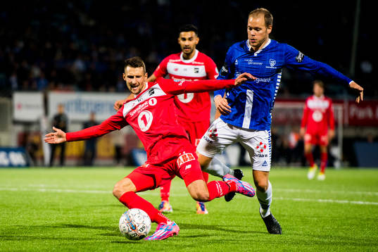 Elbasan Rashani of Odd and Matti Lund Nielsen of Sarpsborg
