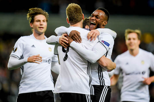 Nicklas Bendtner of Rosenborg celebrates with teammate