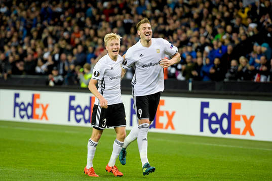 Birger Meling and Nicklas Bendtner of Rosenborg celebrate